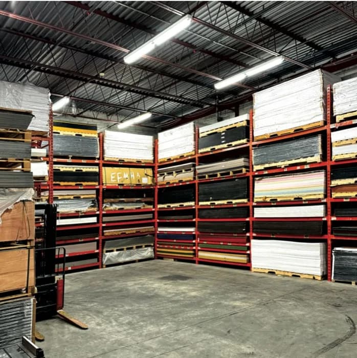 Fidar System Inc. warehouse in North York, Ontario - full shelving of acrylic and plastic sheet inventory