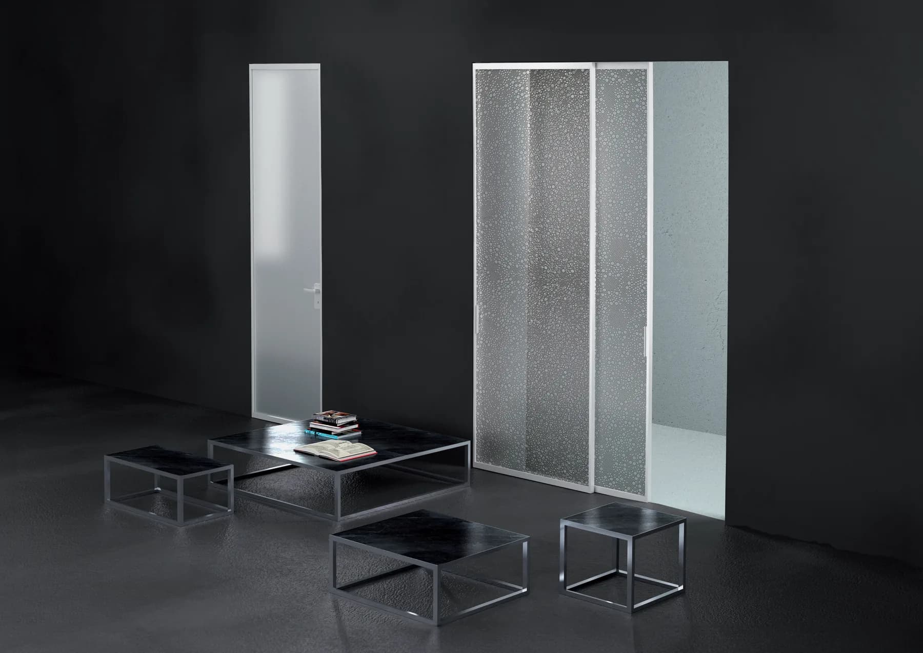Three Fos aluminium framed doors with translucent Bencore panels standing in a dark room beside a low table