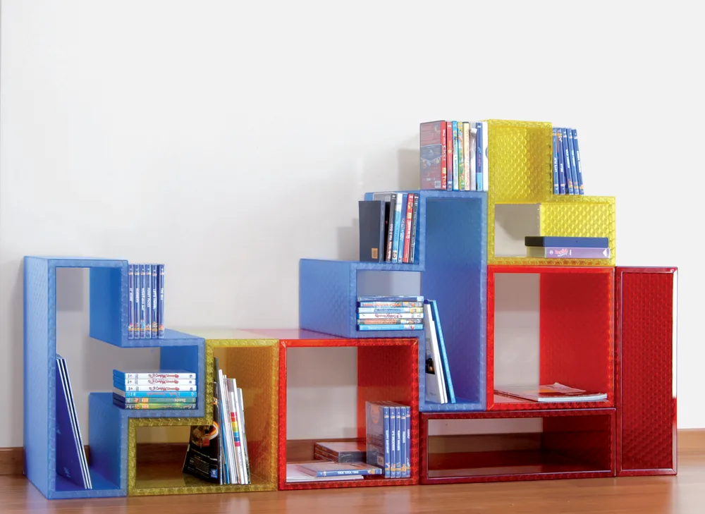 Tetris modular bookcase elements made from Starlight panel in red, blue, yellow and clear