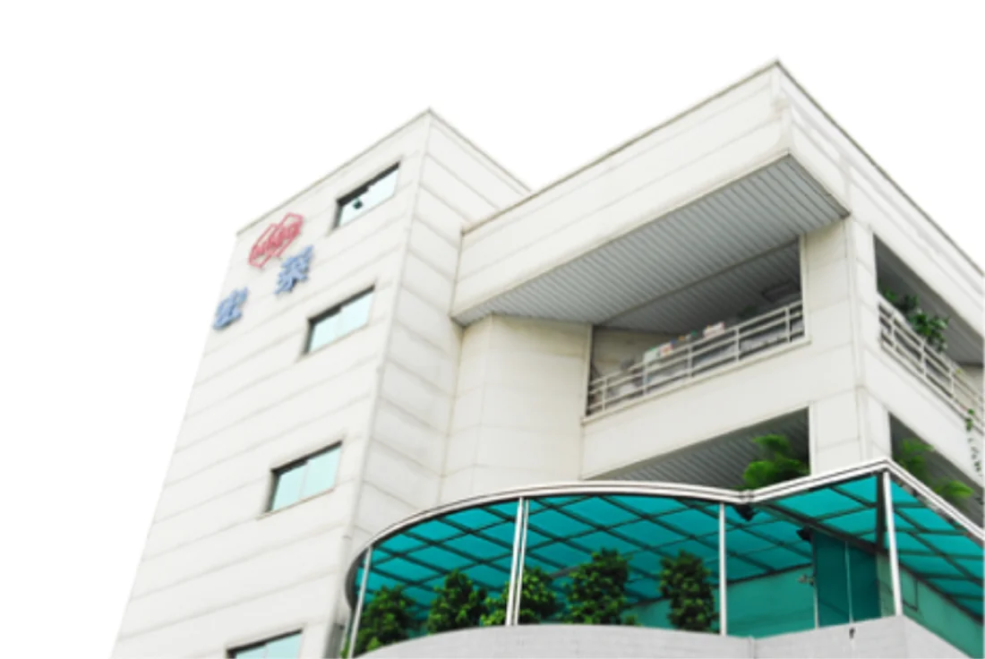 The Hsin Hwa Chemical building in Fangliao, Pingtung County, Taiwan, a white four storey plant with the company name mounted on the corner tower